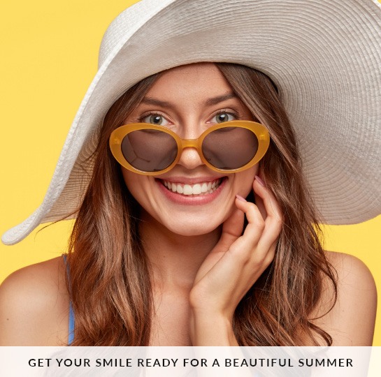 Smiling woman with text 'Get Your Smile Ready for a Beautiful Summer'